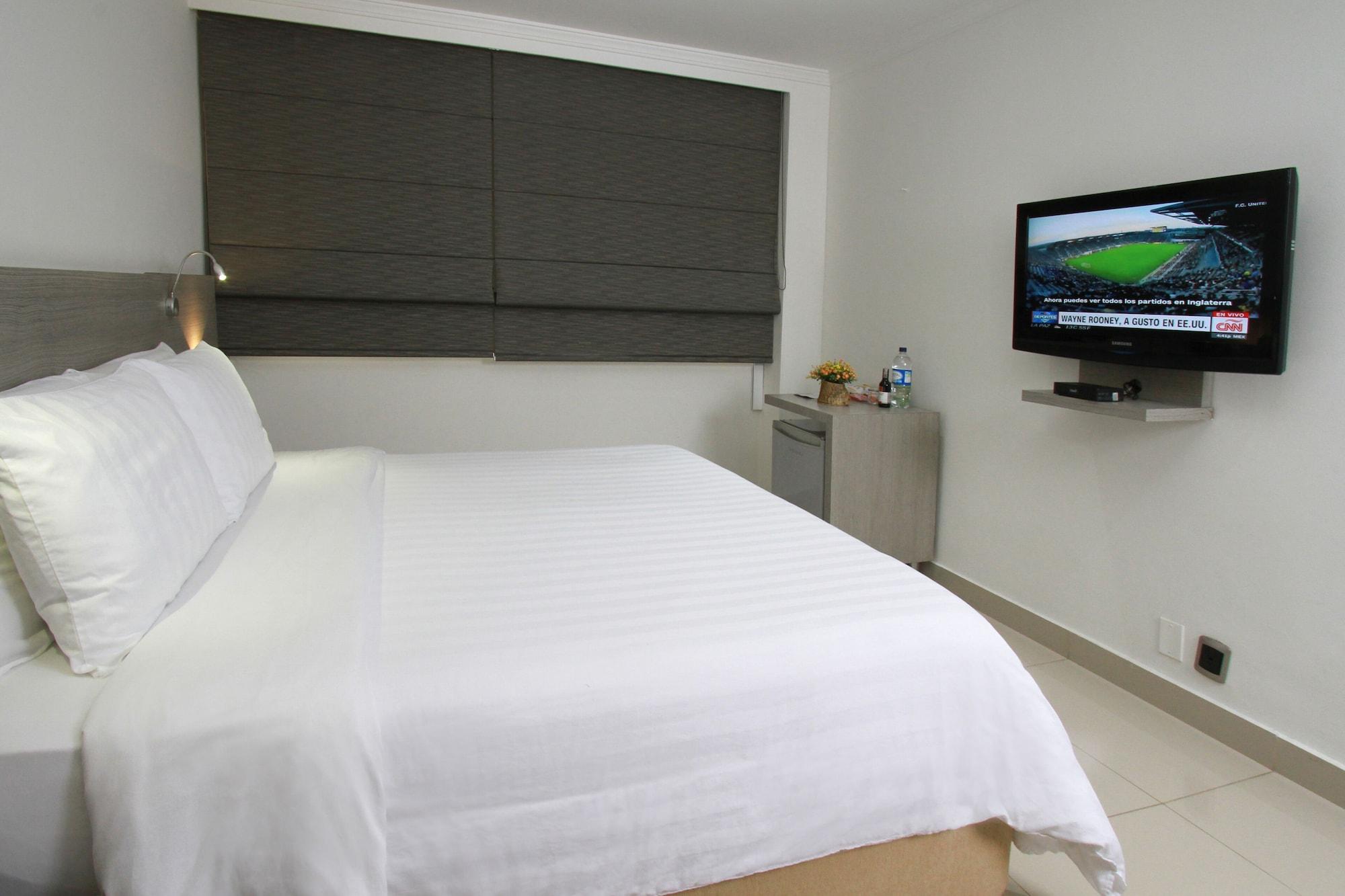 Hotel Barranquilla Plaza Exterior foto A bedroom at the hotel