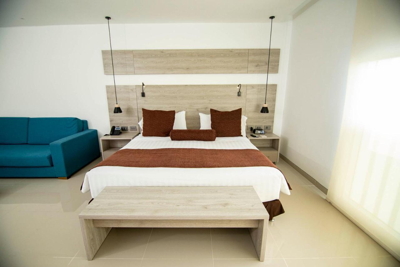 Hotel Barranquilla Plaza Exterior foto A bedroom at the hotel
