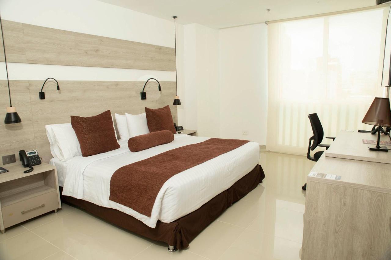 Hotel Barranquilla Plaza Exterior foto A bedroom at the hotel