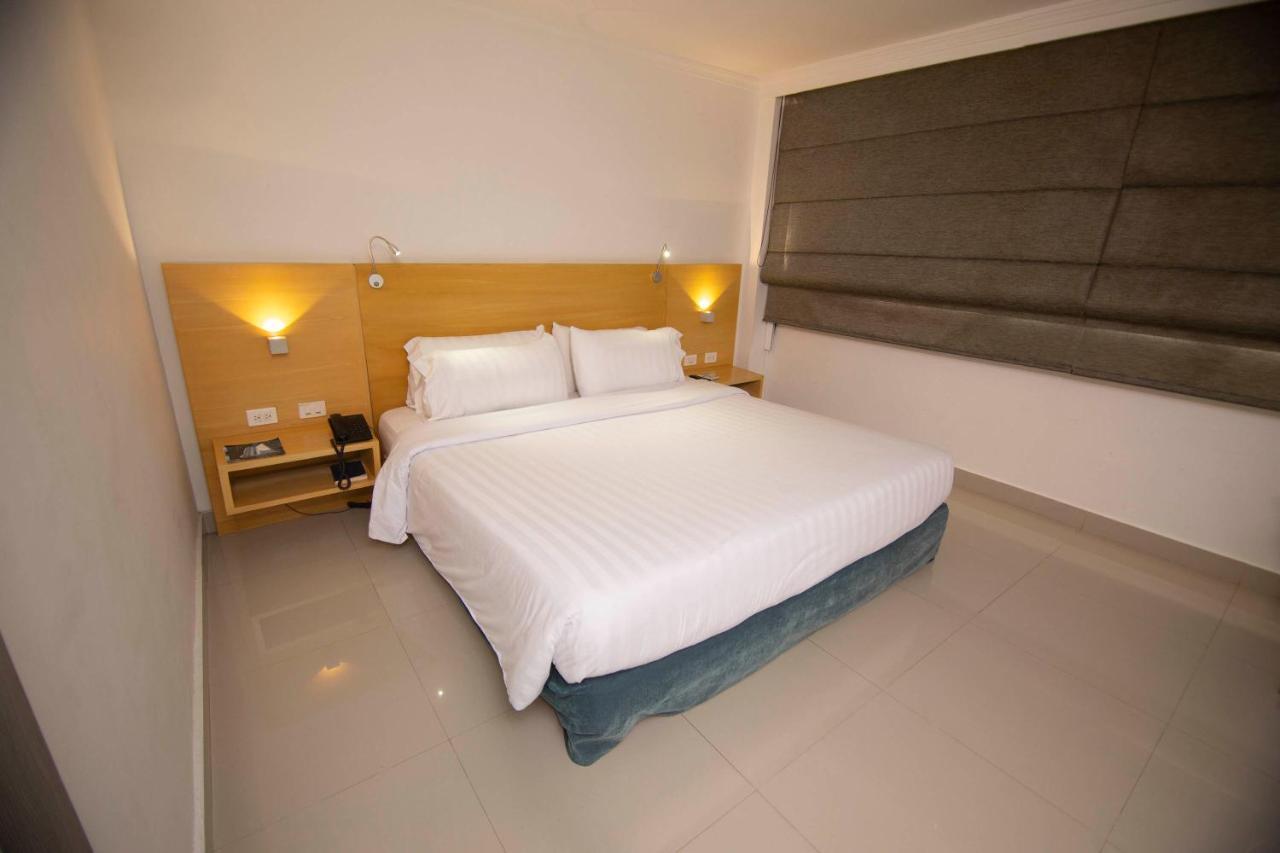 Hotel Barranquilla Plaza Exterior foto A bedroom at the hotel