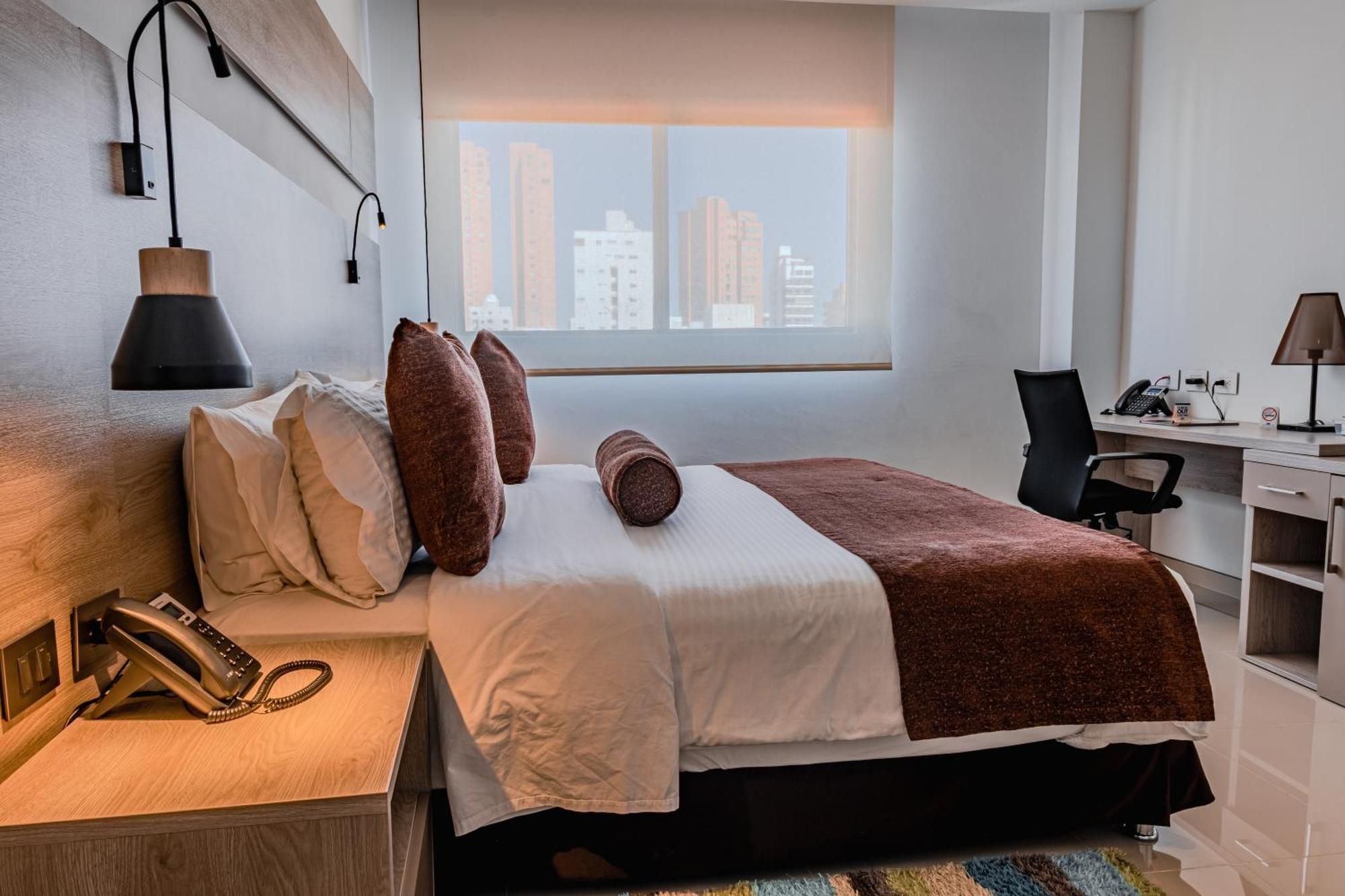 Hotel Barranquilla Plaza Exterior foto A bedroom at the hotel