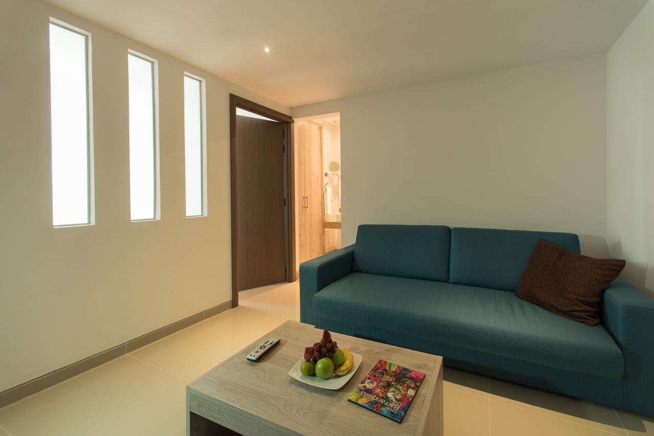 Hotel Barranquilla Plaza Exterior foto A living room in a condominium
